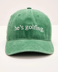 Hes Golfing Baseball Hat