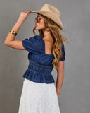 Navelle Smocked Denim Peplum Top