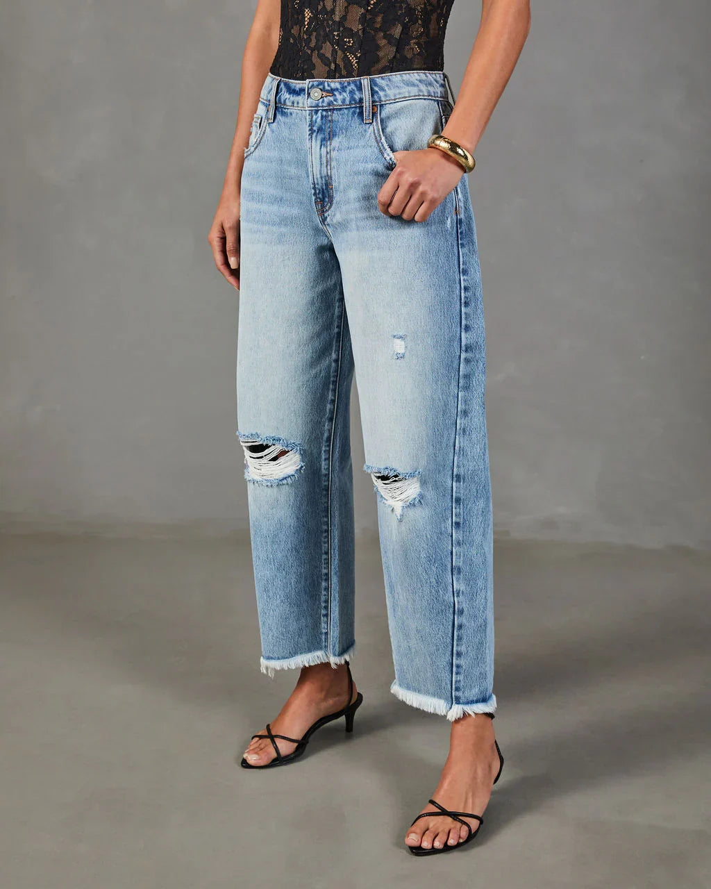 Reworked Frame Rigid Mid Rise Distressed Barrel Leg Jeans